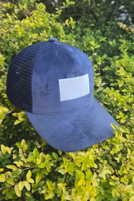 Blue Velvet Hat with a w]White Label